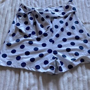Navy blue poke dots with white bow